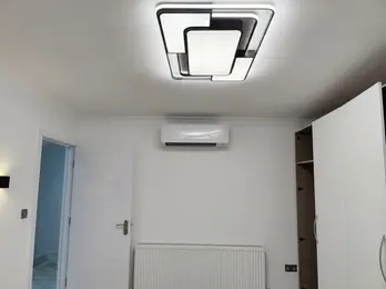 Modern UK home with discreet wall-mounted air conditioning unit